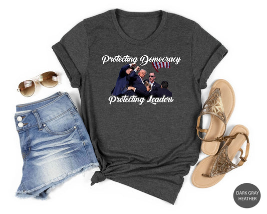 T-shirt « Trump en fuite », T-shirt « Tentative de suicide de Trump », T-shirt « Jamais se rendre », T-shirt « Tireur Trump », T-shirt anti-Biden, T-shirt « Protection des rassemblements », T-shirt « Événement d'actualité »
 T-shirt et sweat à capuche